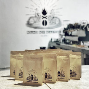 Packs of freshly roasted specialty coffee beans in Singapore
